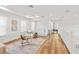 Open loft featuring hardwood floors, ample seating, and a bright, airy atmosphere at 18215 Cayo Largo Pl, Bradenton, FL 34202