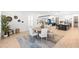 Sunlit dining room featuring a round table, stylish chairs, and contemporary decor at 18215 Cayo Largo Pl, Bradenton, FL 34202