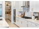 Chef's kitchen featuring modern appliances and beautiful countertops at 18215 Cayo Largo Pl, Bradenton, FL 34202