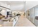 Expansive open-concept living space with soaring ceilings, modern design, and abundant natural light at 18215 Cayo Largo Pl, Bradenton, FL 34202