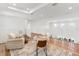 Spacious loft area with hardwood floors offers a versatile space for work or relaxation at 18215 Cayo Largo Pl, Bradenton, FL 34202