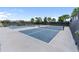 Enjoy the outdoor amenities including pickleball courts and lush tropical landscaping at 18215 Cayo Largo Pl, Bradenton, FL 34202