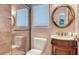 This bathroom features a single sink vanity and a glass enclosed shower at 220 36Th St, Holmes Beach, FL 34217