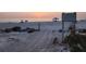 Scenic beach view with a rising sun, rocks, and sandy shorelines at 220 36Th St, Holmes Beach, FL 34217