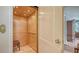 Interior elevator with wood paneling and seating for easy access between floors at 220 36Th St, Holmes Beach, FL 34217