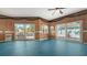 Bright and airy game room with pool table and easy access to outdoor pool and patio area at 220 36Th St, Holmes Beach, FL 34217