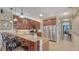 Gourmet kitchen featuring stainless steel appliances, granite countertops, and breakfast bar with seating at 220 36Th St, Holmes Beach, FL 34217