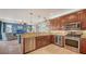 Well-equipped kitchen featuring granite countertops and stainless steel appliances at 220 36Th St, Holmes Beach, FL 34217