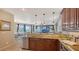 Open-concept kitchen overlooking dining and living areas, great for entertaining and Gathering gatherings at 220 36Th St, Holmes Beach, FL 34217