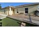Private backyard featuring an outdoor deck, perfect for relaxing and entertaining at 2307 29Th E Ave, Palmetto, FL 34221