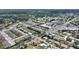 Aerial view showcasing a townhome community in close proximity to local shops and a golf course at 2507 Beneva Rd # 2, Sarasota, FL 34232