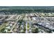 An aerial photograph of a townhome community that has a community pool, stores, and a golf course in close proximity at 2507 Beneva Rd # 2, Sarasota, FL 34232