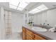 Bathroom featuring a tub and shower, modern vanity and neutral décor at 2507 Beneva Rd # 2, Sarasota, FL 34232