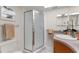 Bathroom featuring a glass shower, modern vanity, and neutral décor at 2507 Beneva Rd # 2, Sarasota, FL 34232