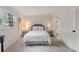 Cozy bedroom with natural light and convenient access to an ensuite bathroom at 2507 Beneva Rd # 2, Sarasota, FL 34232