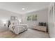 Cozy bedroom with comfortable bed, neutral colors, and natural light at 2507 Beneva Rd # 2, Sarasota, FL 34232