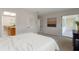 Bright bedroom featuring an ensuite bathroom and access to the sunroom at 2507 Beneva Rd # 2, Sarasota, FL 34232