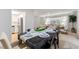 Dining area with table set and views of the kitchen and living room at 2507 Beneva Rd # 2, Sarasota, FL 34232