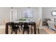 Dining room with modern table setting and neutral décor at 2507 Beneva Rd # 2, Sarasota, FL 34232