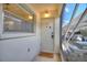 Welcoming front entrance, features an exterior door, welcome mat and window at 2507 Beneva Rd # 2, Sarasota, FL 34232