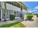Screened in porch and stairs give access to a second story unit in this well maintained complex at 2507 Beneva Rd # 2, Sarasota, FL 34232