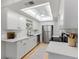 Well-lit, updated kitchen features stainless steel appliances and lots of cabinet space at 2507 Beneva Rd # 2, Sarasota, FL 34232