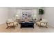 Comfortable living room with neutral tones, plush seating, and bright natural light at 2507 Beneva Rd # 2, Sarasota, FL 34232