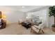 Inviting living area with a cozy couch, chairs, and a view to the outside at 2507 Beneva Rd # 2, Sarasota, FL 34232