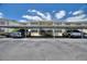 A shared covered parking area offers dedicated parking spots for tenants and their visitors at 2507 Beneva Rd # 2, Sarasota, FL 34232