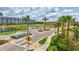 Community entrance, featuring landscaping, ponds, and a crossing guard at 251 Okeeffe Cir, Bradenton, FL 34212