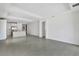 Expansive living area with tile flooring, seamlessly connecting to the kitchen, ideal for entertaining at 251 Okeeffe Cir, Bradenton, FL 34212