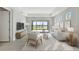 Cozy living room with stylish furniture, neutral decor, and a view of the outdoor area at 251 Okeeffe Cir, Bradenton, FL 34212