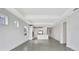 Spacious living area showcasing an open floor plan leading to a modern kitchen at 251 Okeeffe Cir, Bradenton, FL 34212