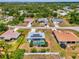Charming single-story home with a screened pool, solar panels, and lush landscaping in a quiet neighborhood at 2759 Starview Ave, North Port, FL 34288