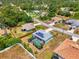 Lovely single-story home with a screened pool, solar panels, and well-maintained landscaping at 2759 Starview Ave, North Port, FL 34288