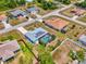 Beautiful single-story home featuring a screened pool, solar panels, and a neatly landscaped yard at 2759 Starview Ave, North Port, FL 34288