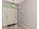 Bright foyer with decorative glass door panels and tile flooring at 2759 Starview Ave, North Port, FL 34288