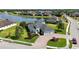 Beautifully landscaped home, in a peaceful neighborhood, boasts a three-car garage at 308 Chantilly Trl, Bradenton, FL 34212