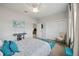 Relaxing bedroom boasts light-filled windows, closet and adjacent doorway at 308 Chantilly Trl, Bradenton, FL 34212