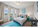 Bright bedroom with large windows, comfortable bedding, and stylish decor at 308 Chantilly Trl, Bradenton, FL 34212