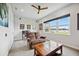 A bonus room offers a cozy sitting area and bright light from the large window at 308 Chantilly Trl, Bradenton, FL 34212
