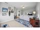 Large bonus room provides comfortable seating, a desk, and a view to the hall at 308 Chantilly Trl, Bradenton, FL 34212