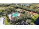 A bird's-eye view of the community amenities including the pool, tennis and basketball courts at 308 Chantilly Trl, Bradenton, FL 34212