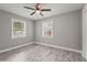 Bedroom features include natural light through the windows, and wood-look flooring for a modern touch at 3102 16Th W Ave, Bradenton, FL 34205