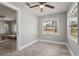 Bedroom with natural light and an open doorway view to the living area, perfect for a flexible layout at 3102 16Th W Ave, Bradenton, FL 34205