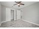 Bedroom features a closet and wood-look flooring providing both comfort and storage space at 3102 16Th W Ave, Bradenton, FL 34205