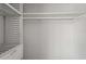 Walk-in closet with ample shelving, creating an organized space for clothing and accessories at 3102 16Th W Ave, Bradenton, FL 34205