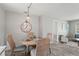 Cozy dining area featuring a round table, wicker chairs, and stylish decor at 3102 16Th W Ave, Bradenton, FL 34205