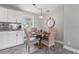 Eat-in kitchen space featuring a charming dining table, stylish lighting, and natural light at 3102 16Th W Ave, Bradenton, FL 34205