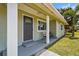Inviting front porch with seating, offering a relaxing outdoor space at the home's entrance at 3102 16Th W Ave, Bradenton, FL 34205